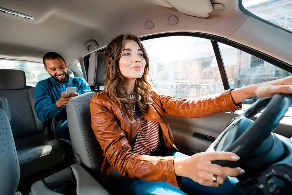 How Much Does Uber & Lyft Cost In Las Vegas? (Rates Compared) 3 Female Uber driver in Las Vegas.