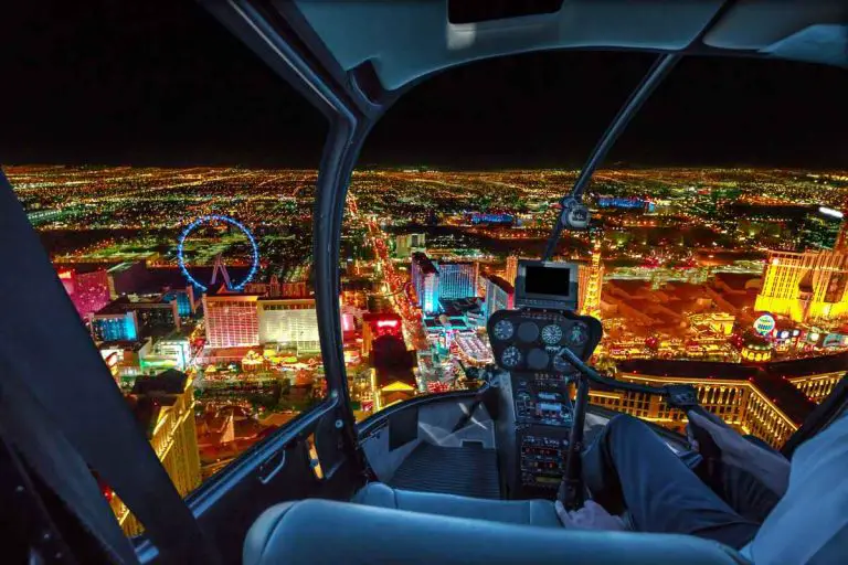 View from a helicopter as it flys over the Vegas Strip at night.