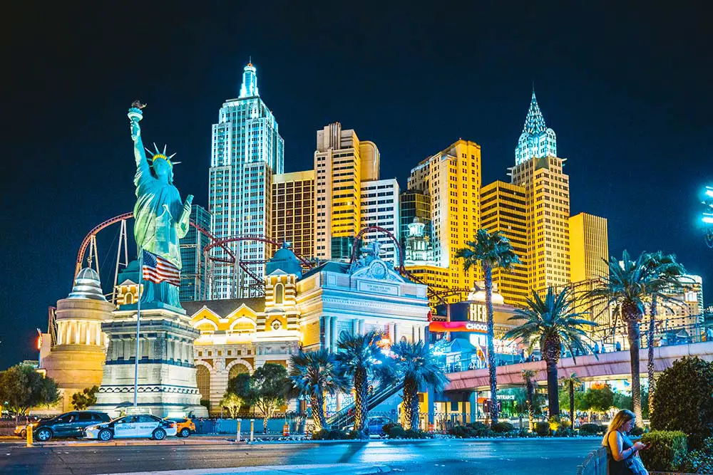 Las Vegas Strip FREE Walking Tour & Map (19 Must-See Stops!) 6 Walking past New York-New York Las Vegas at night