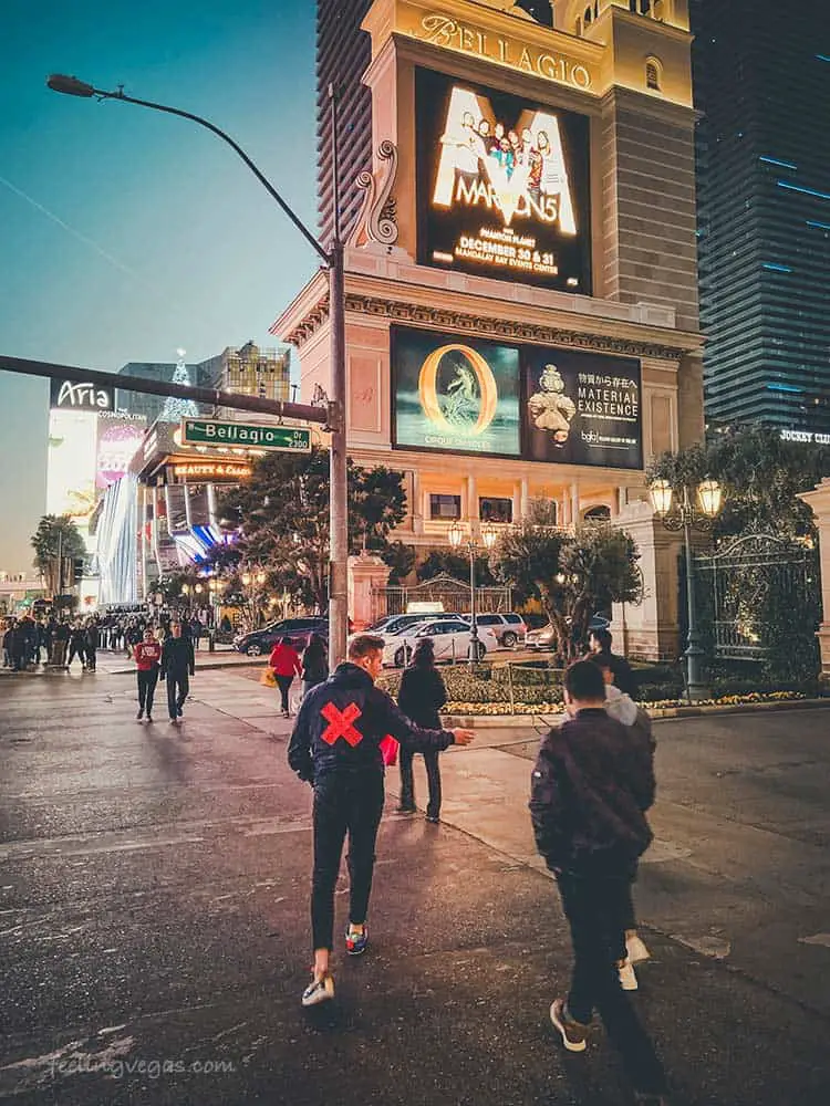 Preparing For Your Las Vegas Trip (17 Things to Know!) 3 Tourists walking on the Las Vegas Strip.