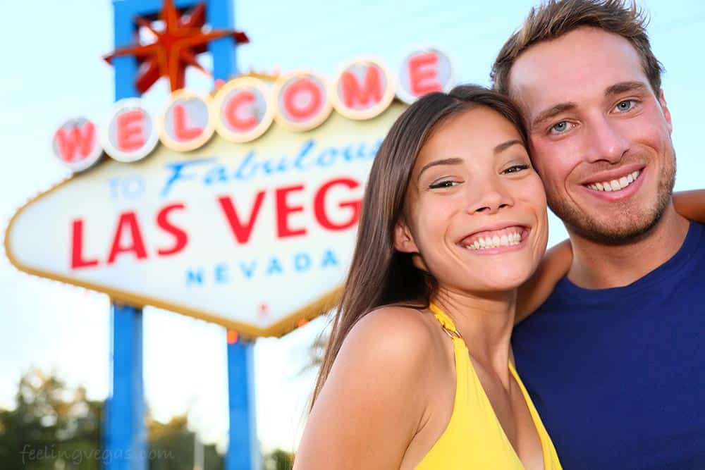 10 Romantic Things to Do in Las Vegas for Couples 1 Couple in front of Vegas sign: Romantic things to do in Las Vegas for couples