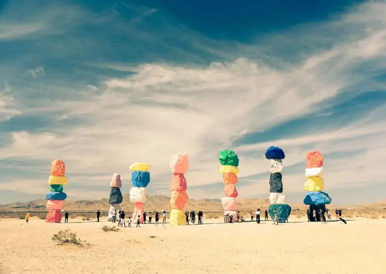 Tourists visit the Seven Magic Mountains outside of Las Vegas.