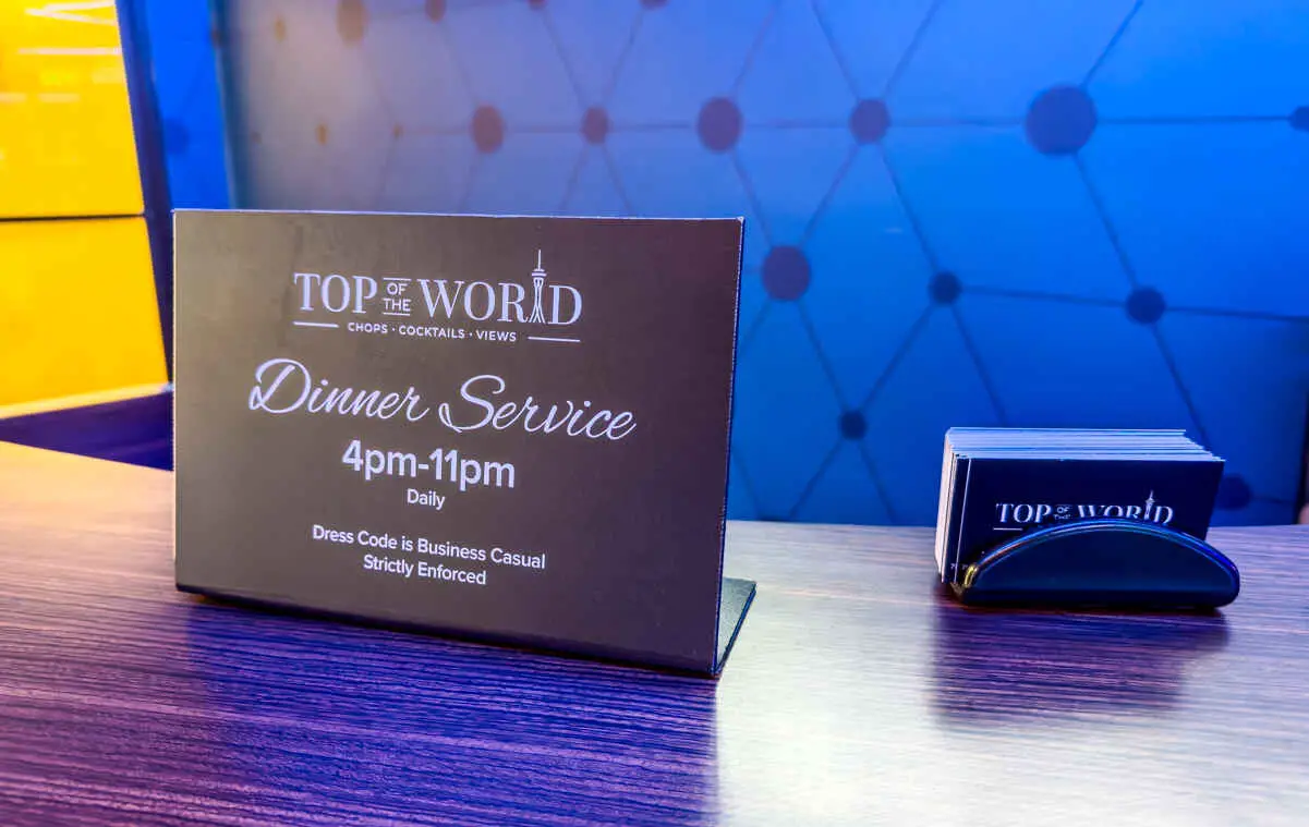 Dress Code for Top of the World Restaurant in Las Vegas (Stratosphere) 1 Sign on Reservation Desk at Top of The World Restuarant at The Strat