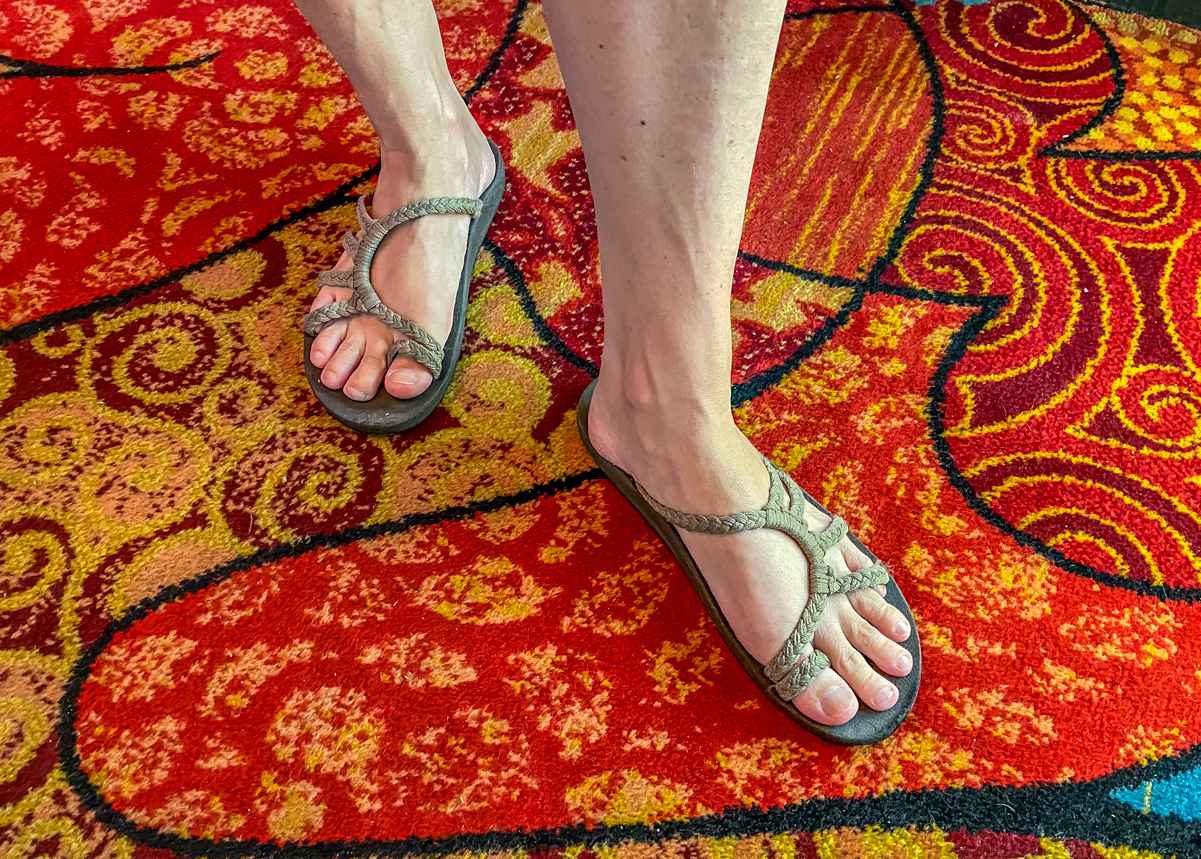 Can You Wear Flip Flops in Vegas Casinos? (Answered) 2 Woman wearing flip flop types sandals inside a Las Vegas casino