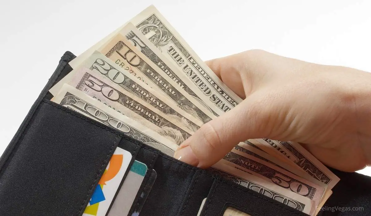 6 Things You Need Cash for in Las Vegas (Explained) 2 Cash in wallet. What you need cash for in Vegas.